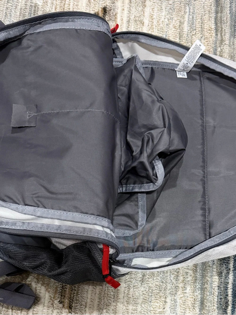 Under Armour Light Gray and Dark Gray Storm Backpack with Red Pulls